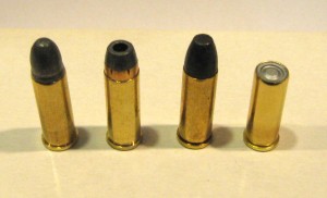 .32 S&W Longs, L to R:   Remington round nose, 98-grain;  MagTech jacketed hollow point, Sellier & Bellot 100-gr flat nose;  Handload with flush seated 98 grain wadcutter 